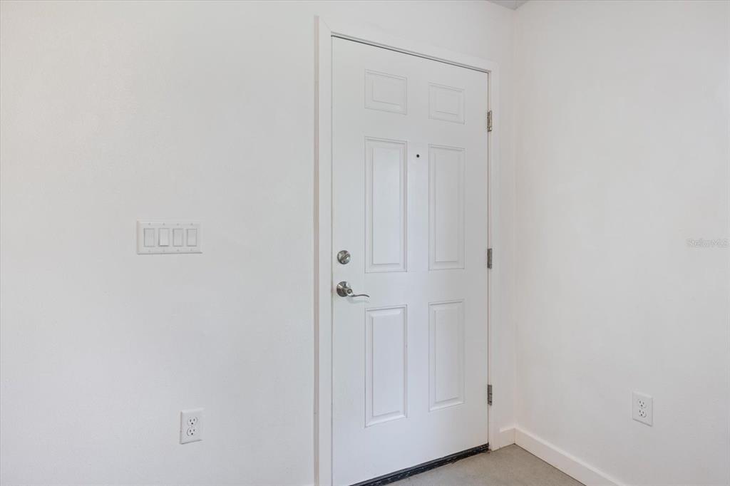8915 Vamo Road Sarasota, FL 34231 - Photo 30 of 61 a view of an empty room
