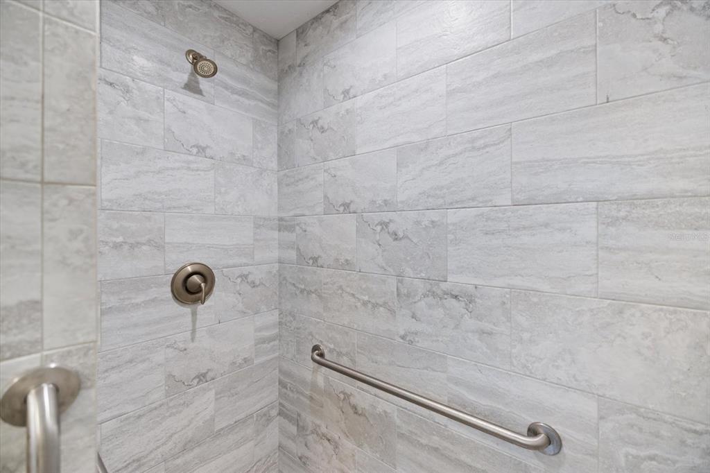 8915 Vamo Road Sarasota, FL 34231 - Photo 42 of 61 a bathroom with a shower