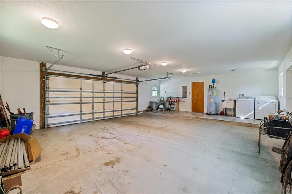 8915 Vamo Road Sarasota, FL 34231 - Photo 45 of 61 a view of a livingroom with gym equipment and a window