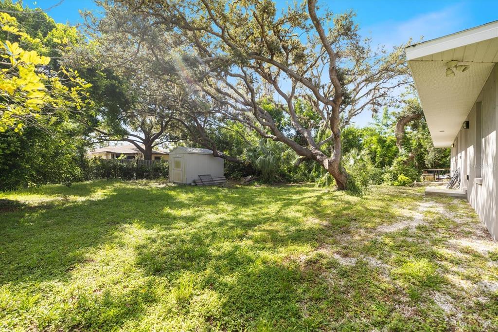8915 Vamo Road Sarasota, FL 34231 - Photo 50 of 61 a view of a yard