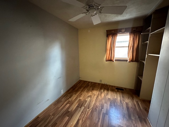 735 Geneva Avenue Romeoville, IL 60446 - Photo 11 of 25 wooden floor in an empty room with a window