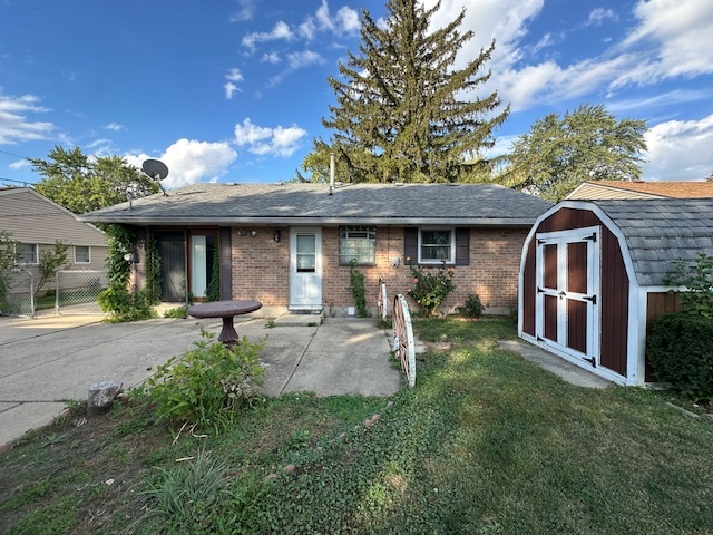 735 Geneva Avenue Romeoville, IL 60446 - Photo 25 of 25 a front view of a house with garden