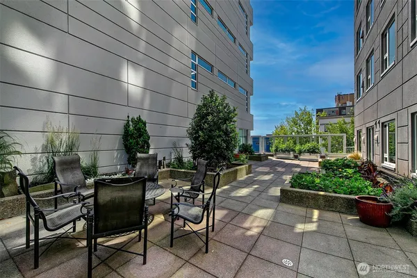 a view of a terrace with sitting area