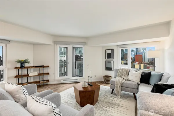 a living room with furniture and a window