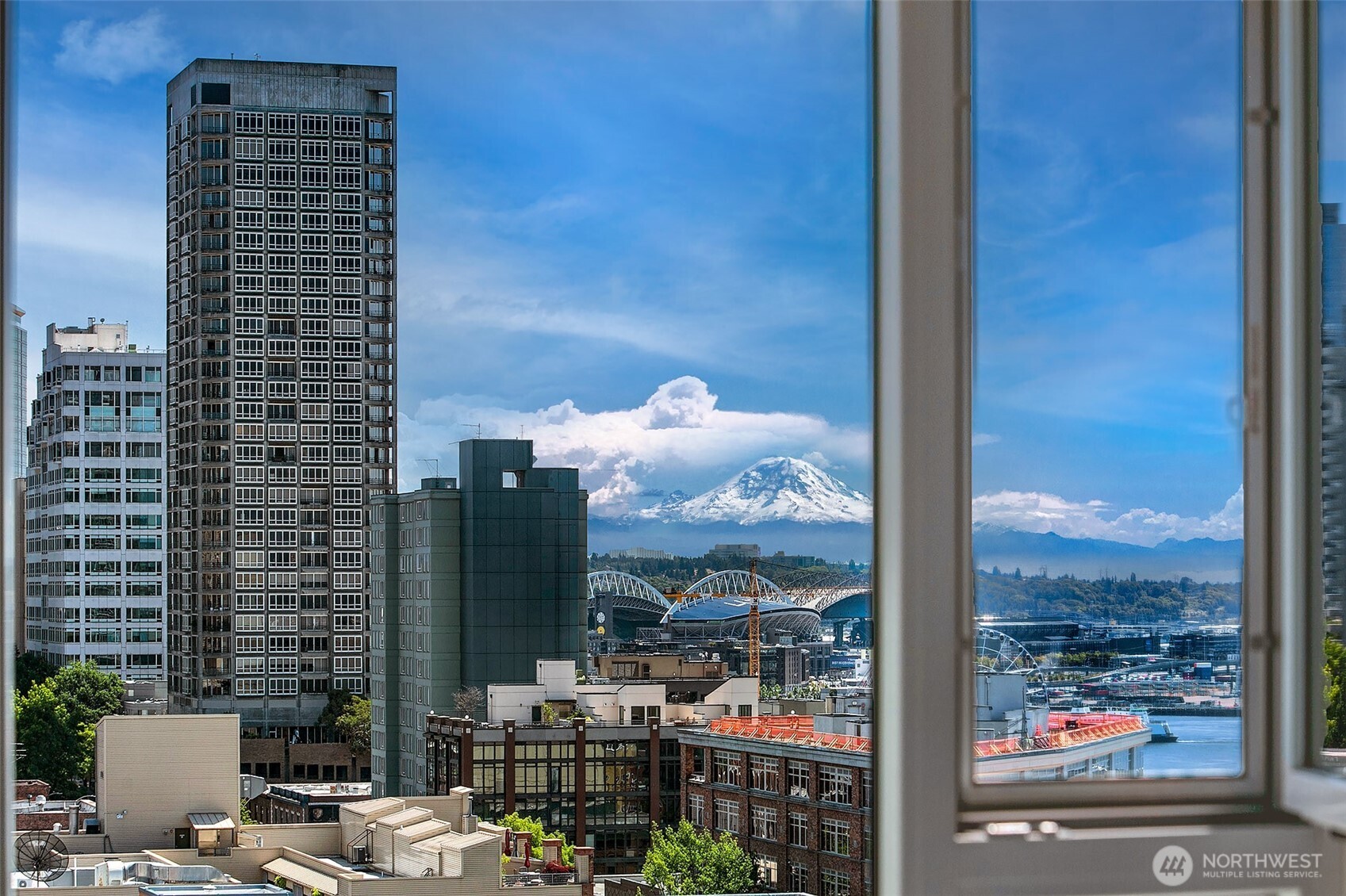 121 Vine Street, Unit 1507 Seattle, WA 98121 - Photo 9 of 40 a view of a city from a balcony
