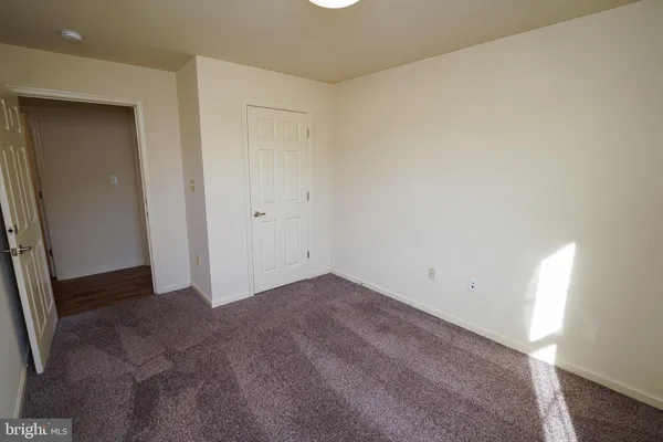 an empty room with an entryway
