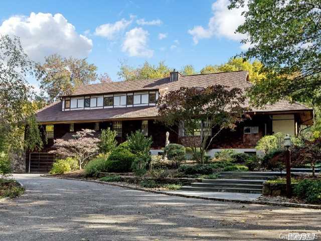 8 Mt Misery Road Huntington, NY 11743 - Photo 1 of 1 Front view from the circular driveway