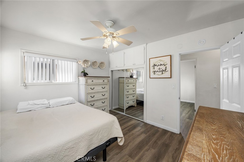 435 East Adams Street Santa Ana, CA 92707 - Photo 13 of 32 a bedroom with a bed and a chandelier
