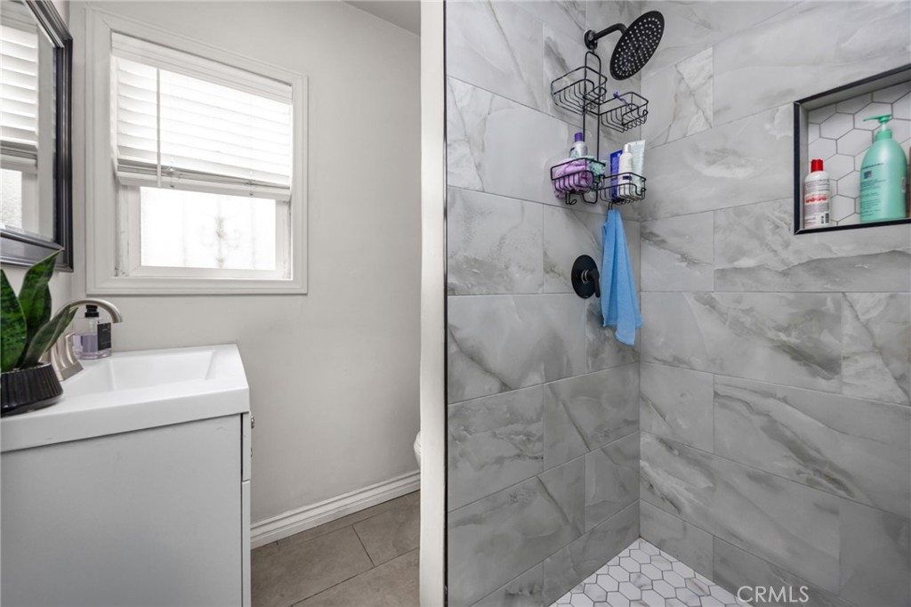 435 East Adams Street Santa Ana, CA 92707 - Photo 15 of 32 a bathroom with a shower