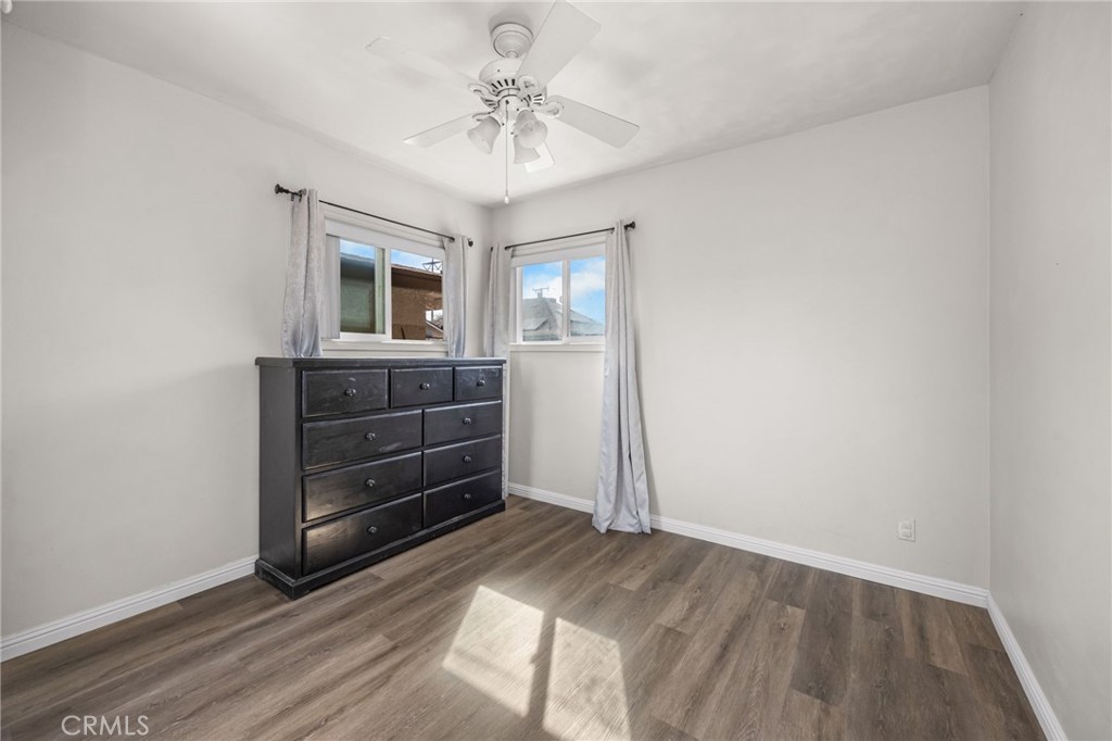 435 East Adams Street Santa Ana, CA 92707 - Photo 16 of 32 a view of room with wooden floor and window