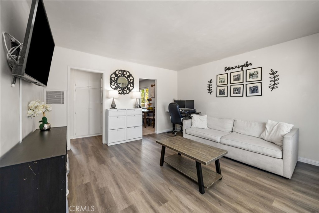 435 East Adams Street Santa Ana, CA 92707 - Photo 5 of 32 a living room with furniture and a flat screen tv