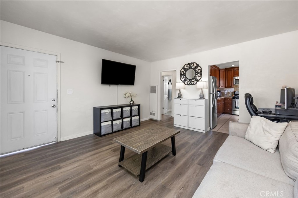 435 East Adams Street Santa Ana, CA 92707 - Photo 8 of 32 a living room with furniture and a flat screen tv
