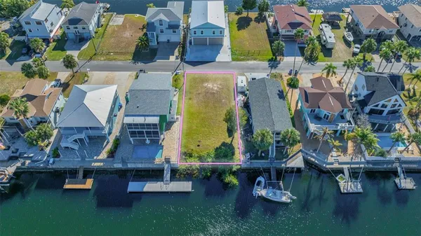an aerial view of houses with outdoor space