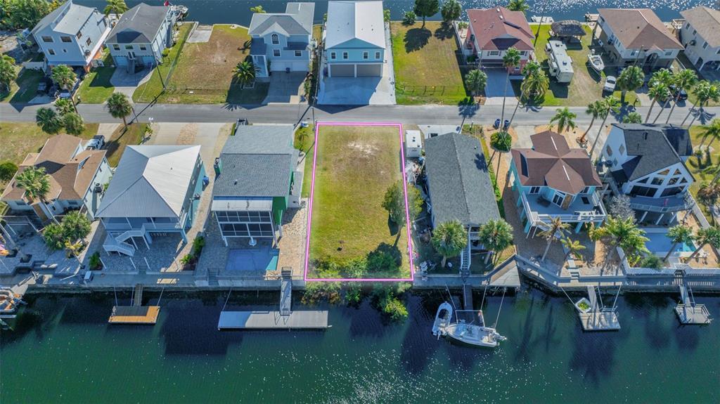 4029 Casa Court Hernando Beach, FL 34607 - Photo 4 of 10 an aerial view of houses with outdoor space