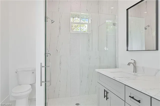 a view of room with a ceiling fan