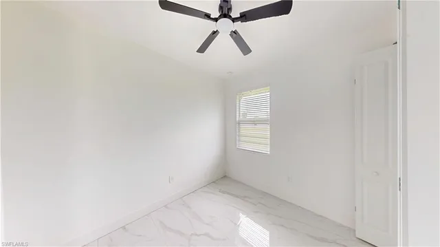 a kitchen with stainless steel appliances a refrigerator sink and microwave