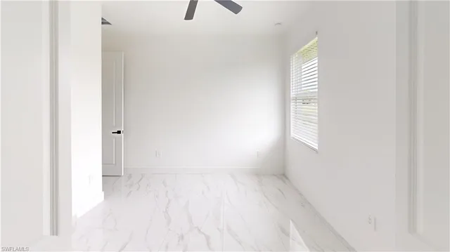 a view of empty room with window