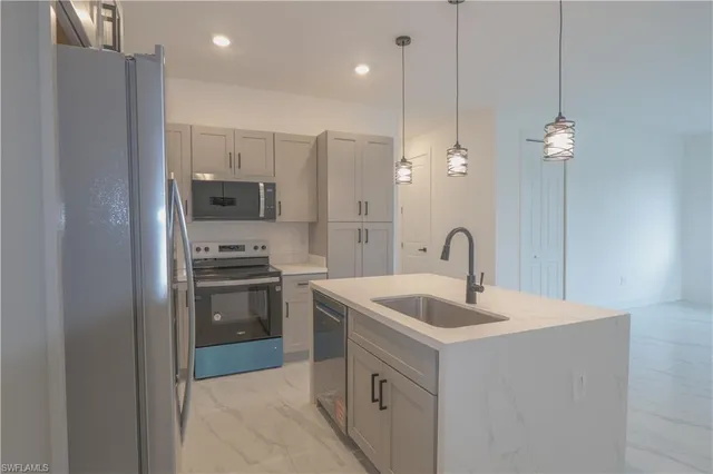 a bathroom with a double vanity sink and mirror