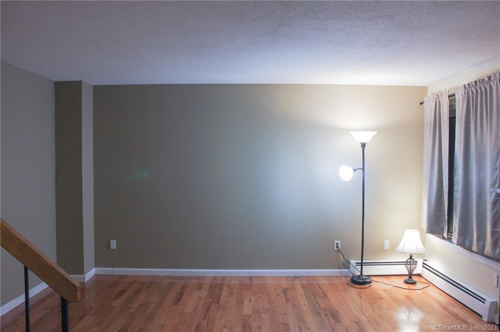 60 Old Town Road, Unit 171 Vernon, CT 06066 - Photo 2 of 30 an empty room with a door