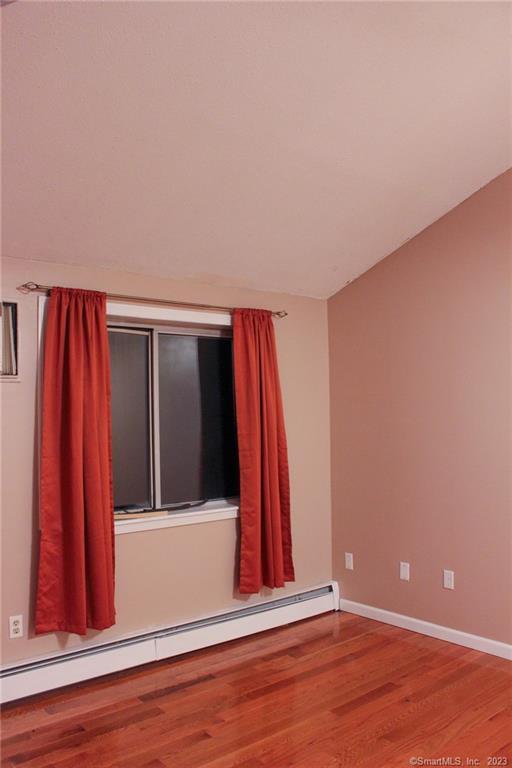 60 Old Town Road, Unit 171 Vernon, CT 06066 - Photo 23 of 30 a view of a room with a wooden floor and a window