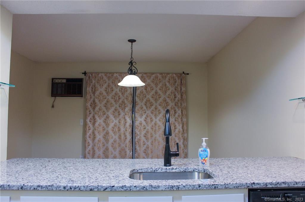 60 Old Town Road, Unit 171 Vernon, CT 06066 - Photo 10 of 30 a view of a wooden floor and a sink