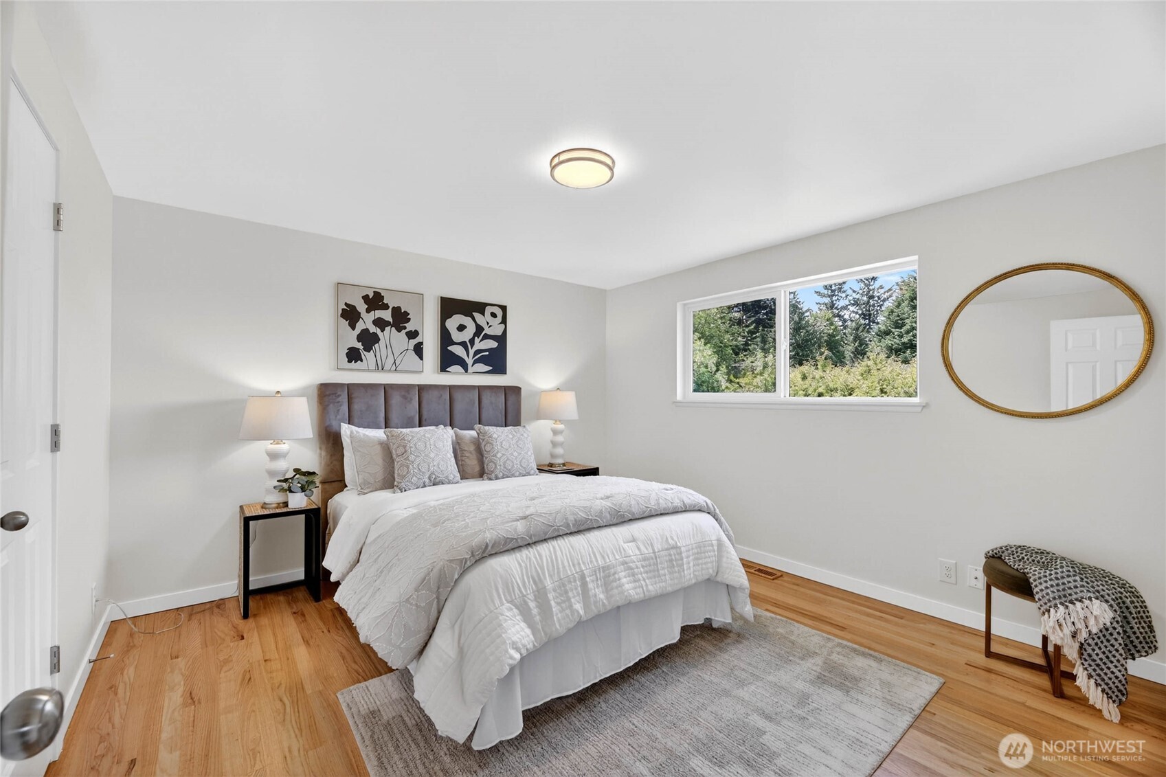 9114 207th Place Southwest Edmonds, WA 98026 - Photo 14 of 36 a bedroom with a bed and a lamp