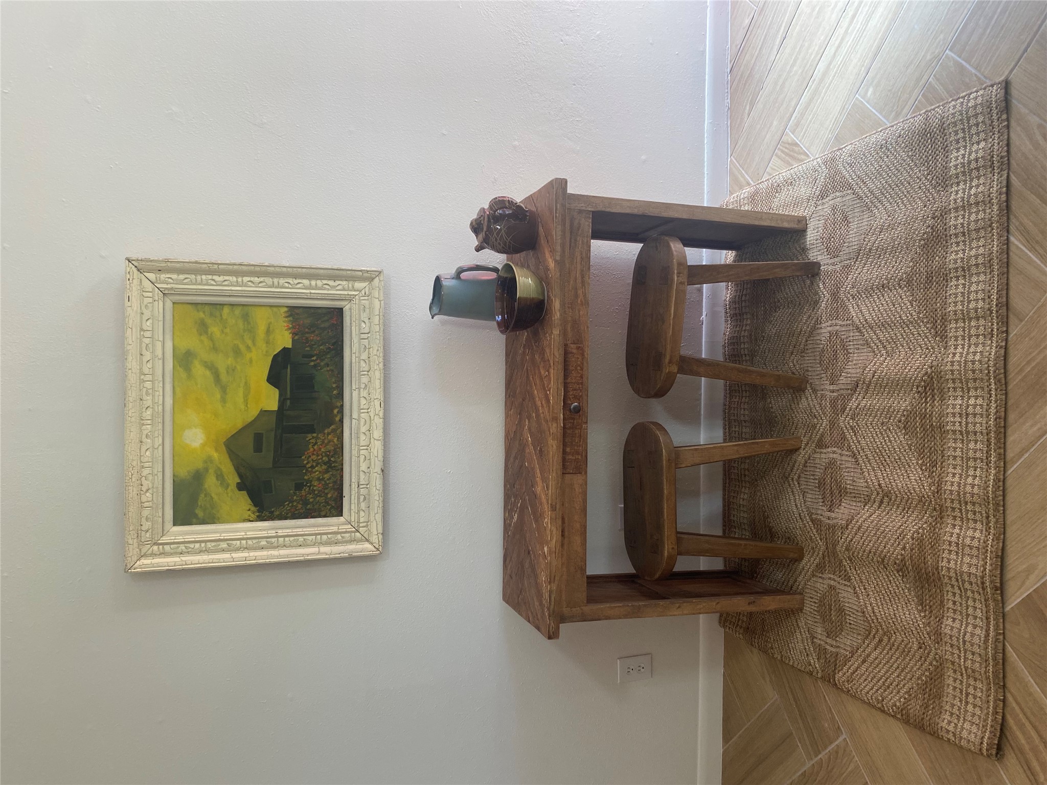 1700 Houston Street, Unit 103 Austin, TX 78756 - Photo 8 of 8 Detailed view of baseboards and wood tiled floors