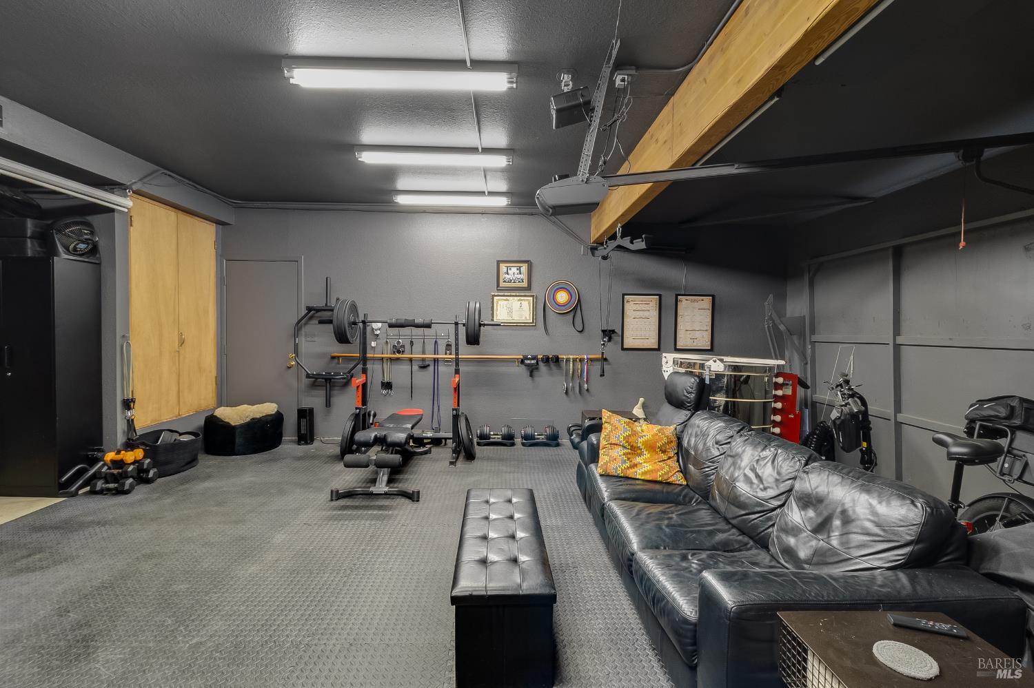 153 Incline Place Benicia, CA 94510 - Photo 12 of 99 Garage has been sheet rocked to create additional space: currently being used as a home gym and media room