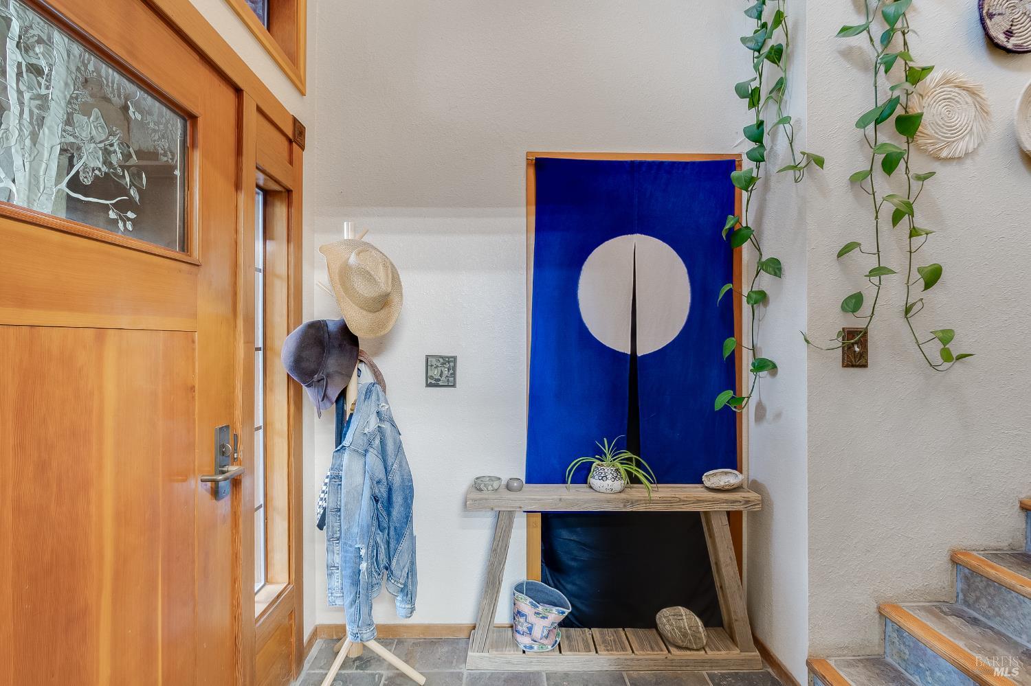 153 Incline Place Benicia, CA 94510 - Photo 10 of 99 Behind this blue curtain is a door that could connect the ADU to the mai house.