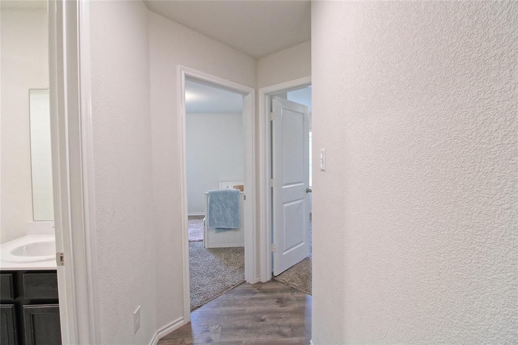 2428 Rosharon Drive Forney, TX 75126 - Photo 13 of 34 a view of a bathroom with a sink