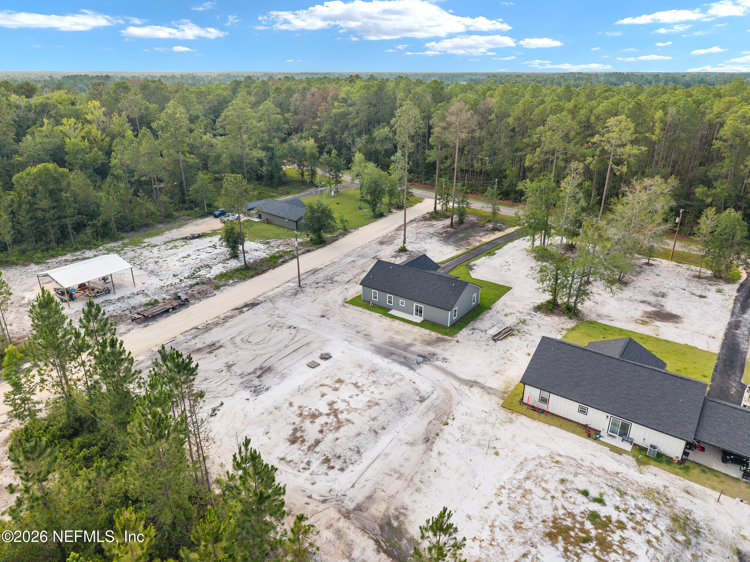 9284 Southwest Sw Cr Hampton, FL 32044 - Photo 43 of 48 DJI_20260625184422_0349_D