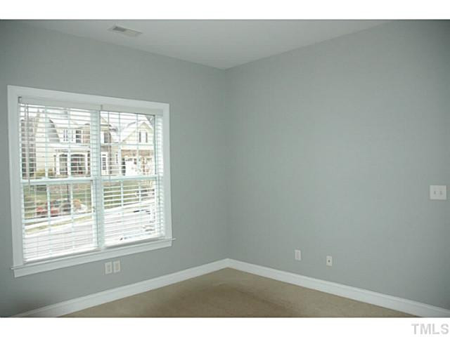 9312 Tabriz Point Raleigh, NC 27614 - Photo 16 of 25 Upstairs bedroom. Double closets.