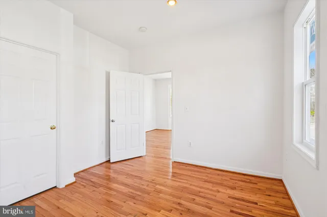 a view of a livingroom with wooden floor