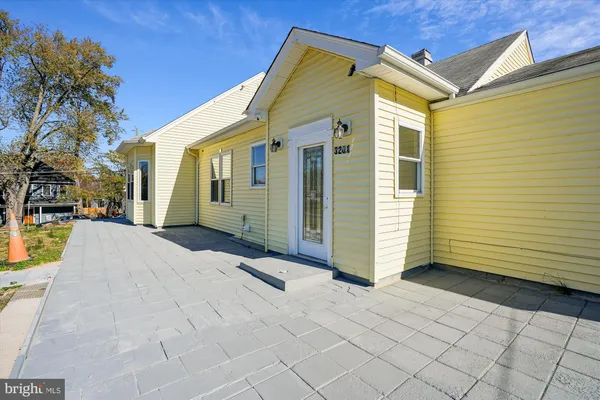 a view of a back yard of the house
