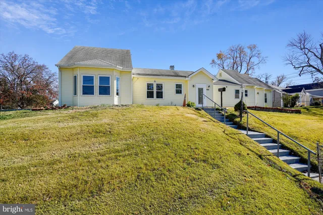a view of a house with a swimming pool