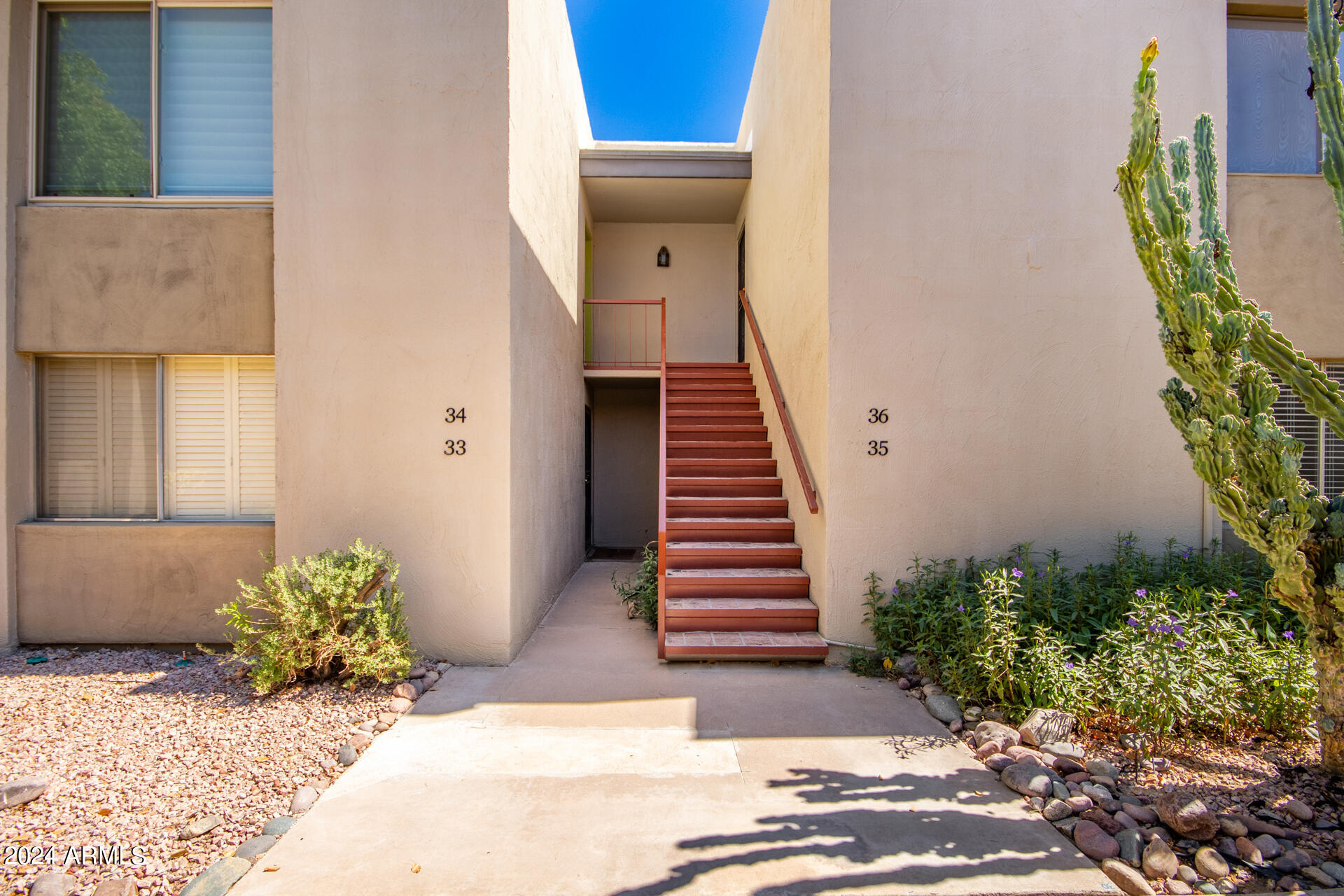 4201 East Camelback Road, Unit 35 Phoenix, AZ 85018 - Photo 12 of 33 a view of entryway with a garden