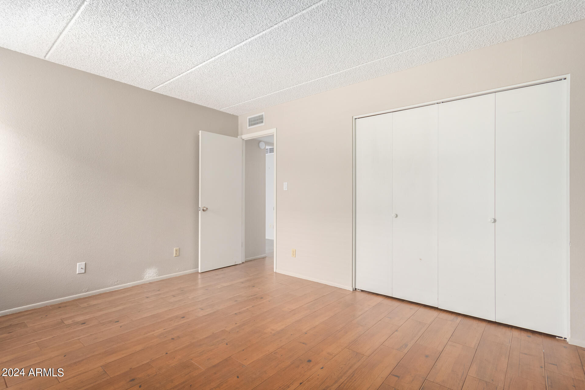 4201 East Camelback Road, Unit 35 Phoenix, AZ 85018 - Photo 26 of 33 a view of an empty room