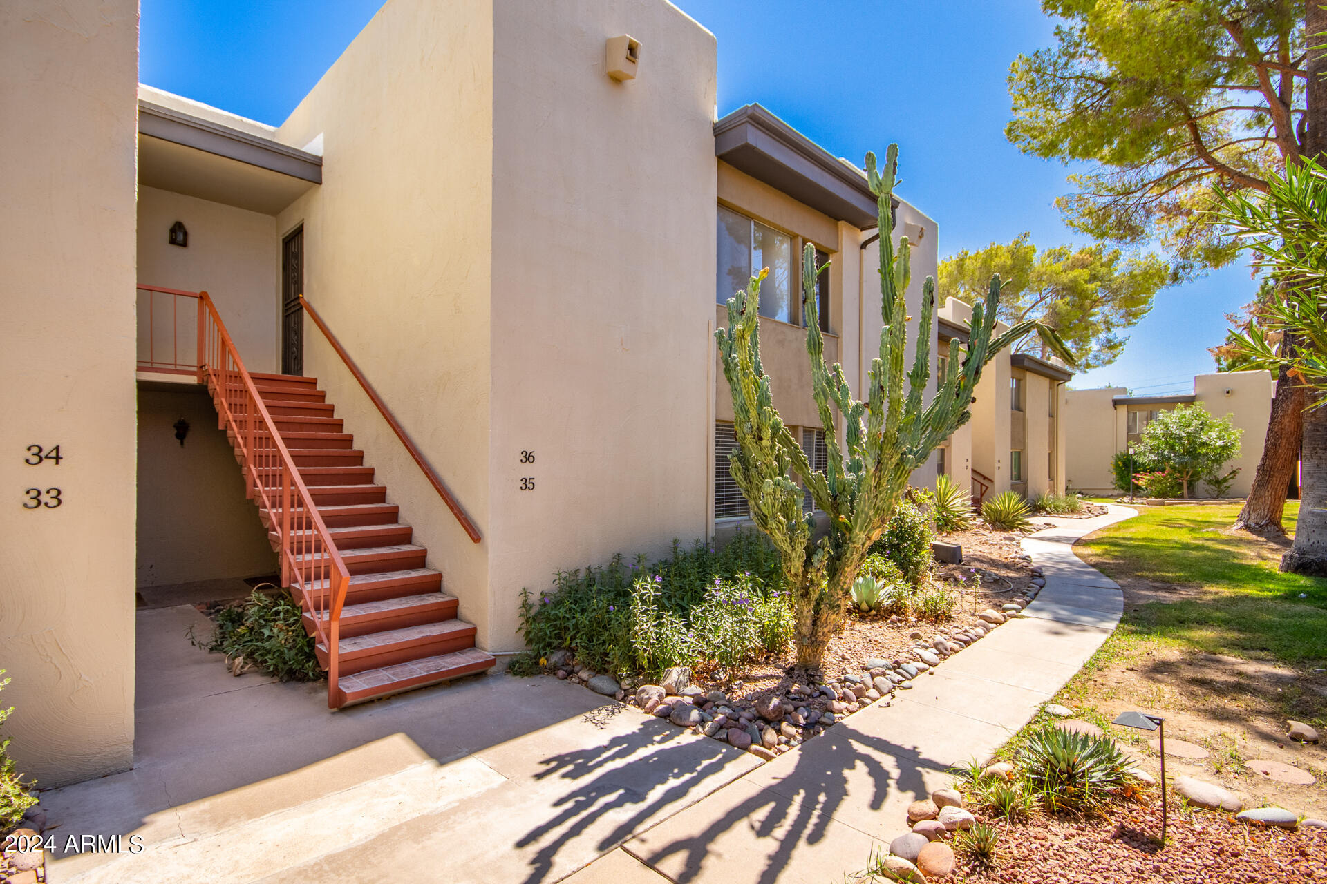 4201 East Camelback Road, Unit 35 Phoenix, AZ 85018 - Photo 8 of 33 a view of an entryway with wooden floor