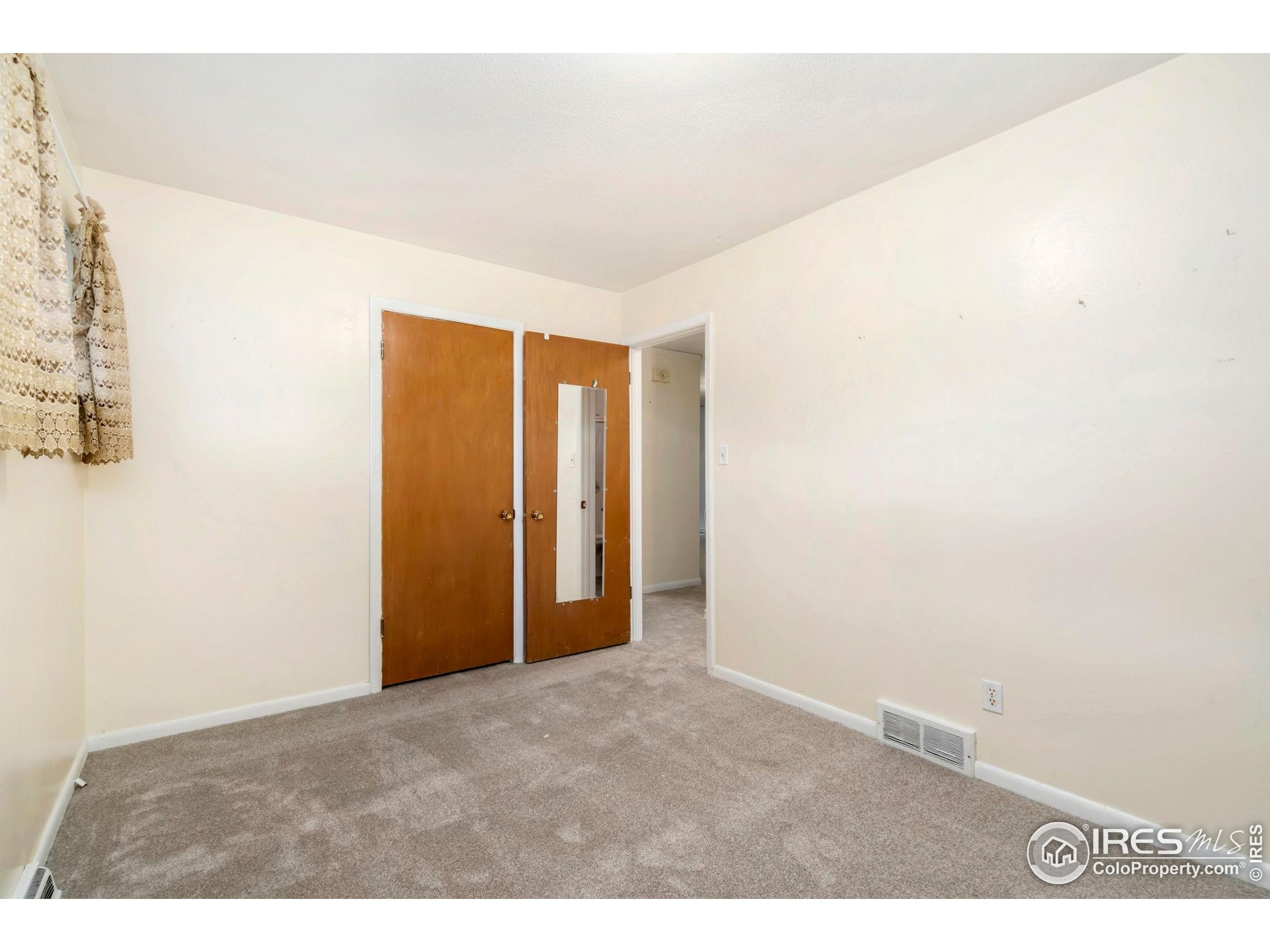 2046 26th Street Road Greeley, CO 80631 - Photo 16 of 34 a view of an empty room
