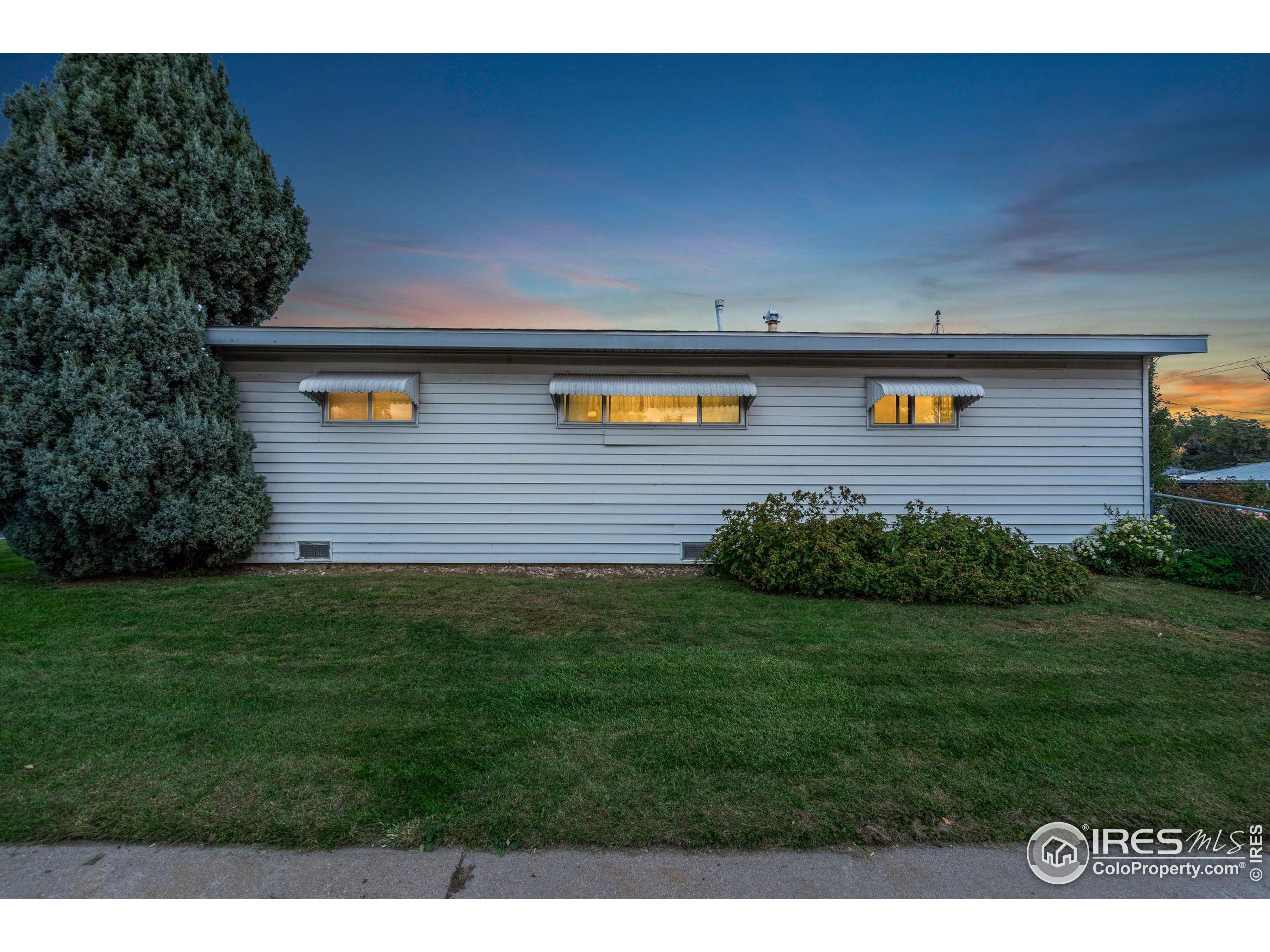2046 26th Street Road Greeley, CO 80631 - Photo 4 of 34 a view of a backyard
