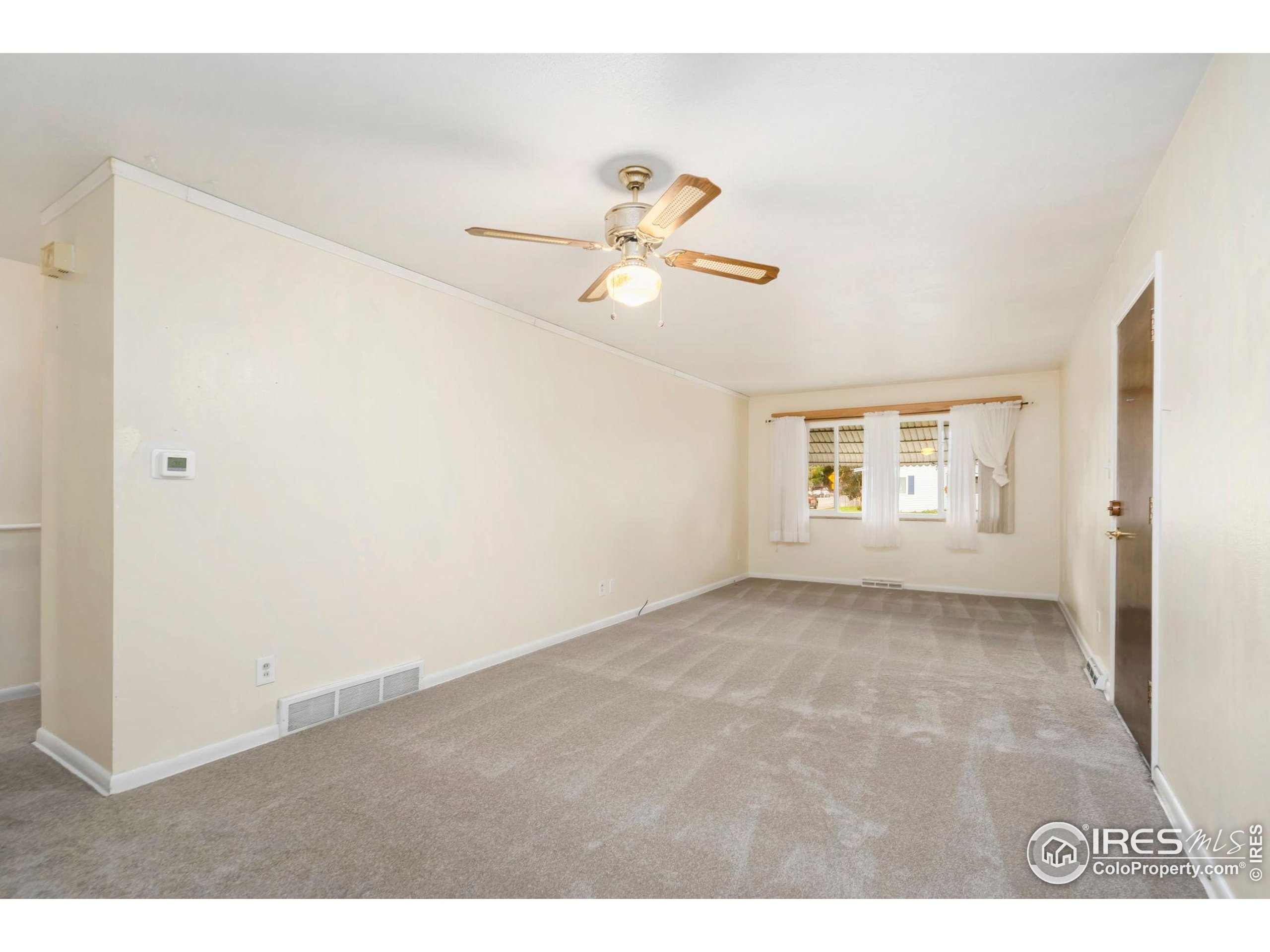 2046 26th Street Road Greeley, CO 80631 - Photo 7 of 34 a view of an empty room
