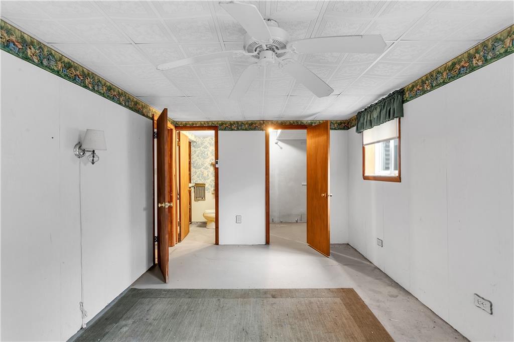 306 Ridgeway Drive Baden, PA 15005 - Photo 20 of 25 a view of entryway with a rug and ceiling fan