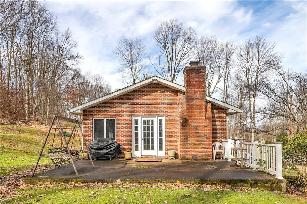 306 Ridgeway Drive Baden, PA 15005 - Photo 3 of 25 a view of a house with backyard and sitting area