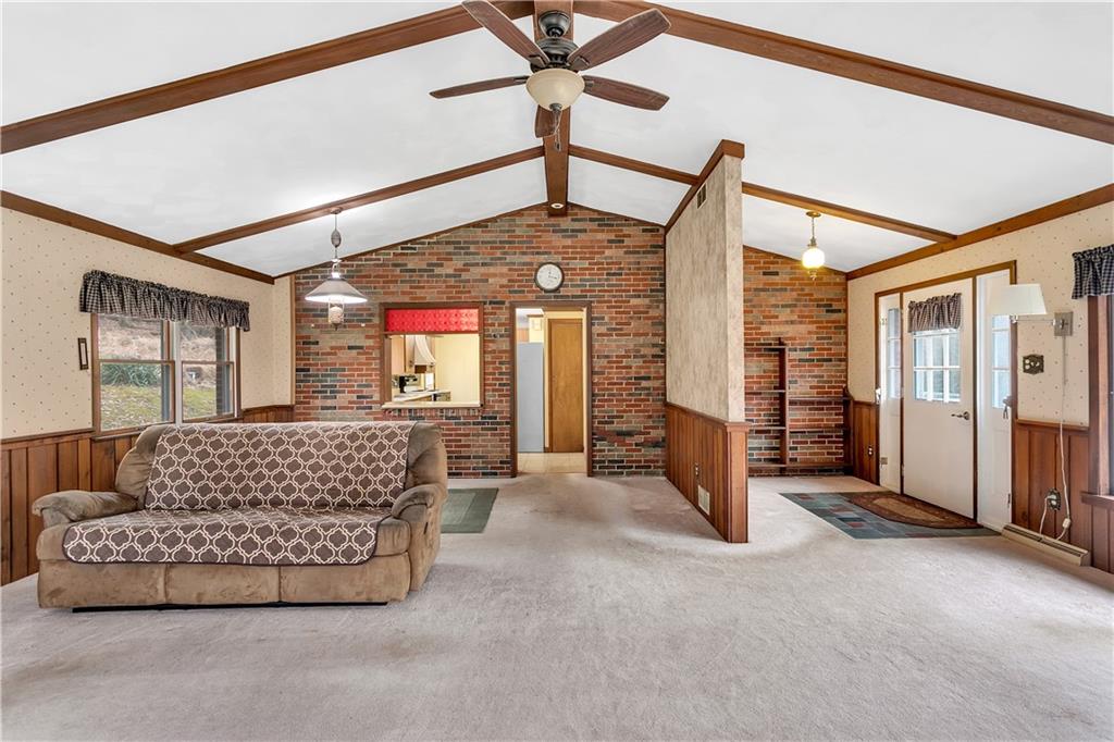 306 Ridgeway Drive Baden, PA 15005 - Photo 5 of 25 a living room with furniture and a window