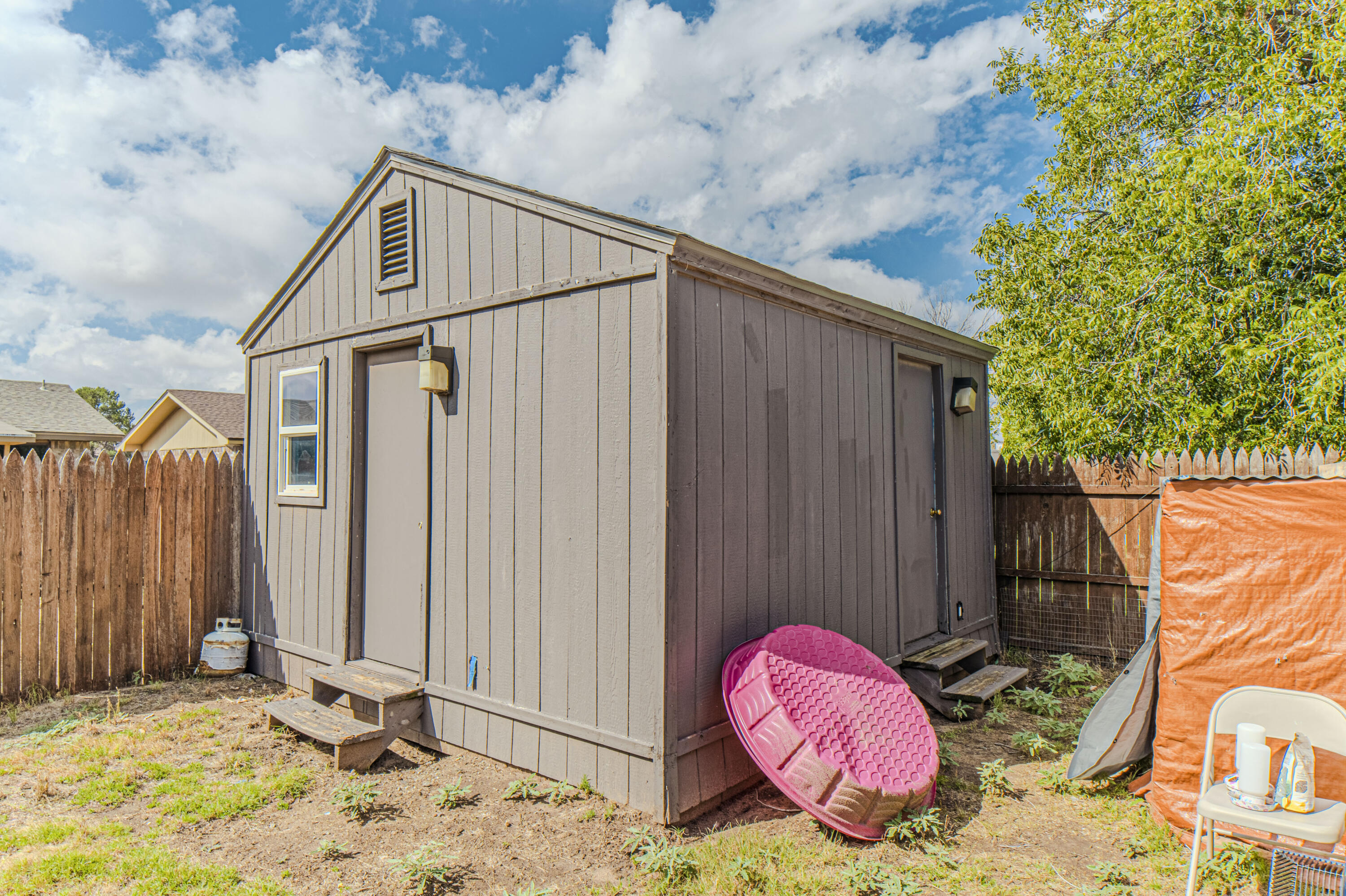 6015 14th Street Lubbock, TX 79416 - Photo 21 of 24 a backyard of a house