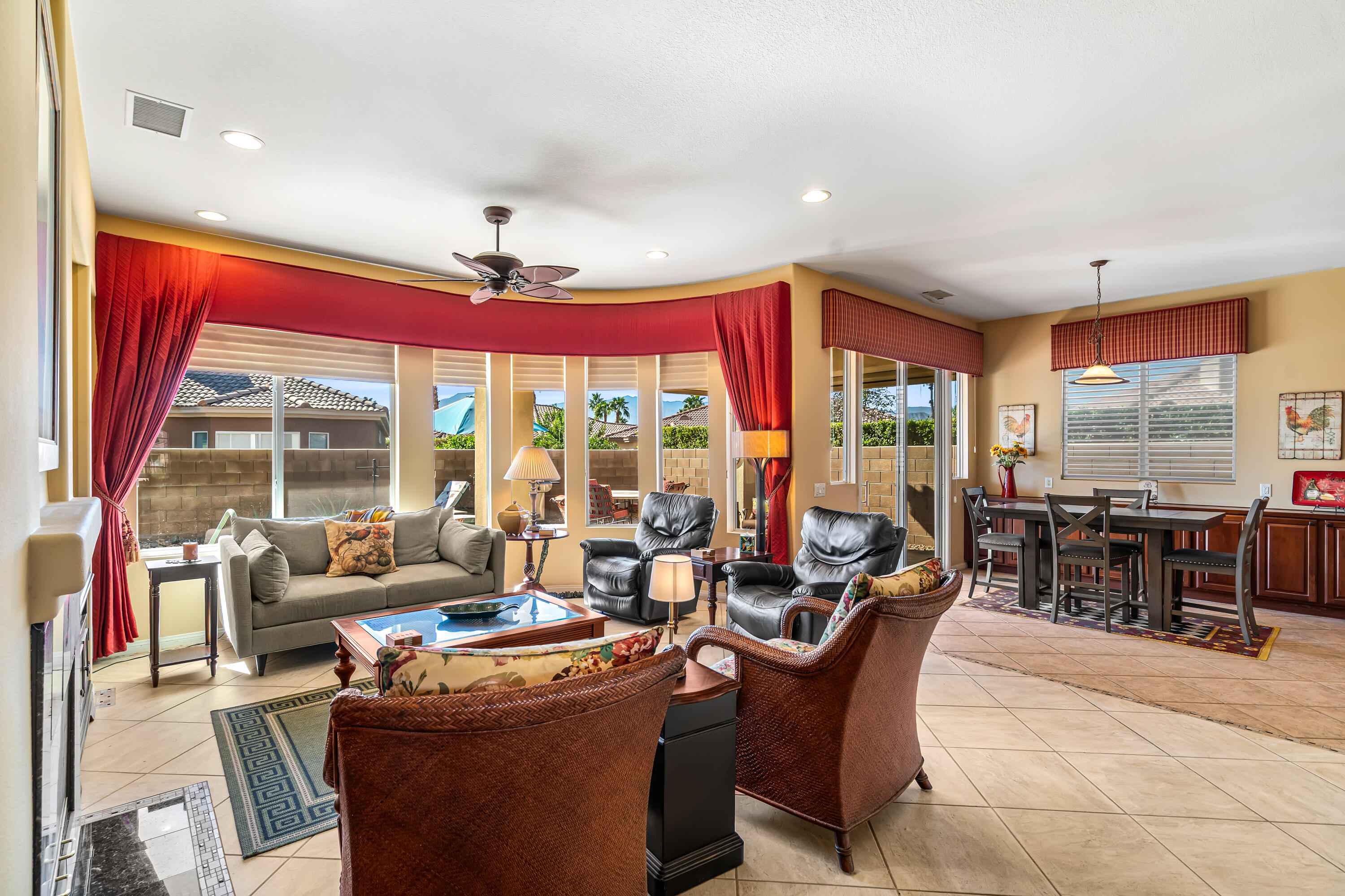 80607 Prestwick Place Indio, CA 92201 - Photo 15 of 68 a living room with furniture a large window with outer view