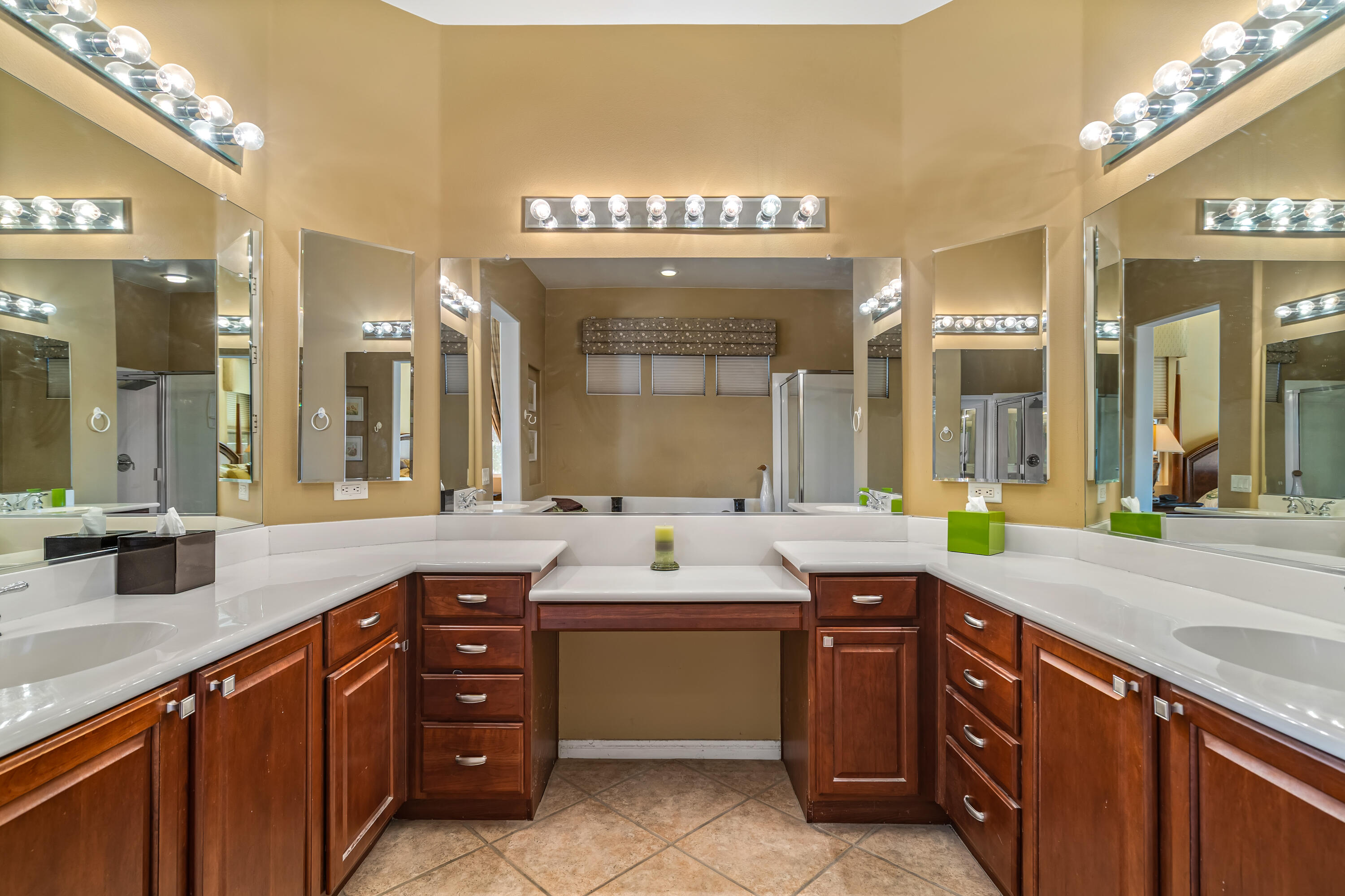 80607 Prestwick Place Indio, CA 92201 - Photo 30 of 68 a bathroom with a sink vanity and a mirror