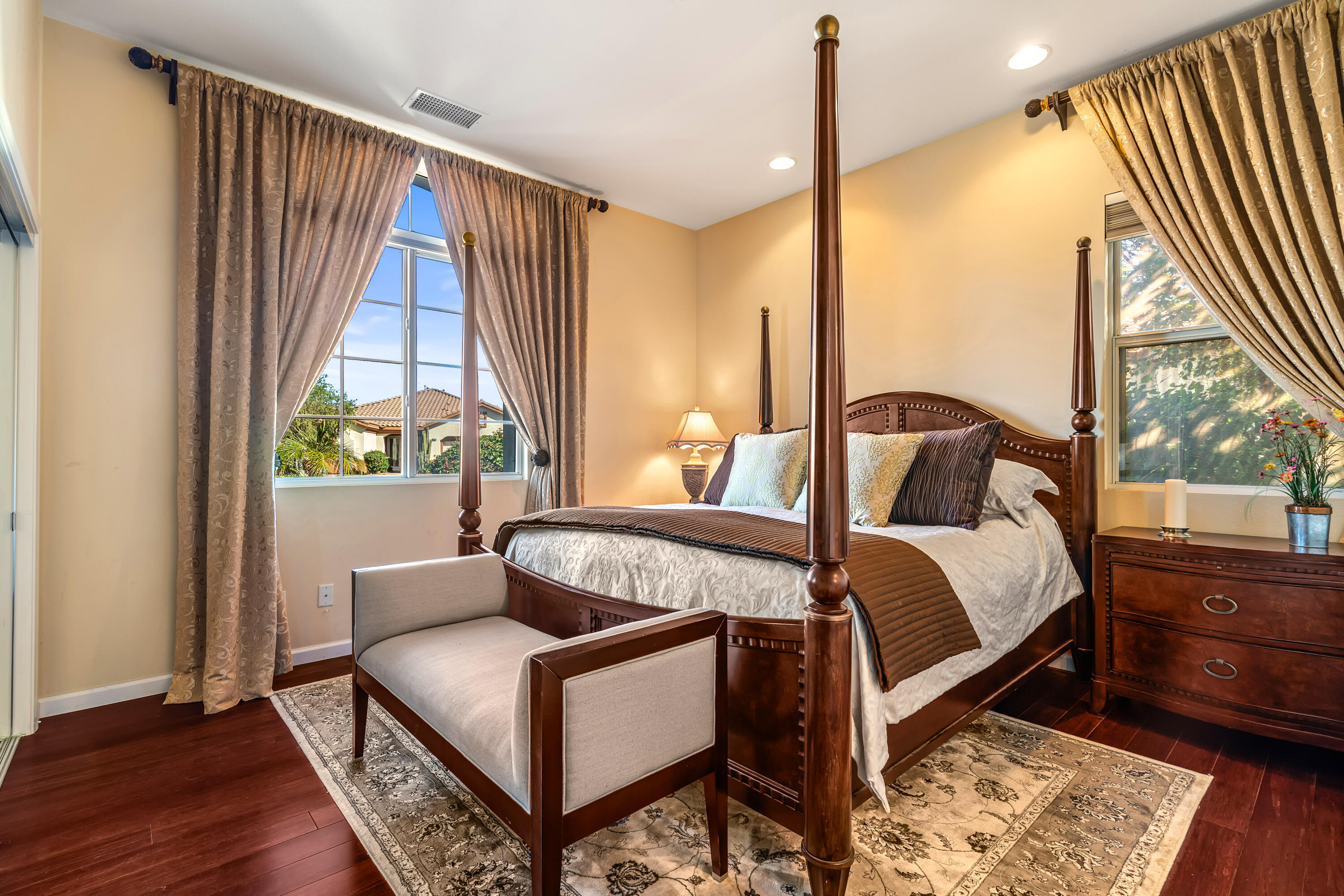 80607 Prestwick Place Indio, CA 92201 - Photo 35 of 68 a bedroom with a bed and wooden floor