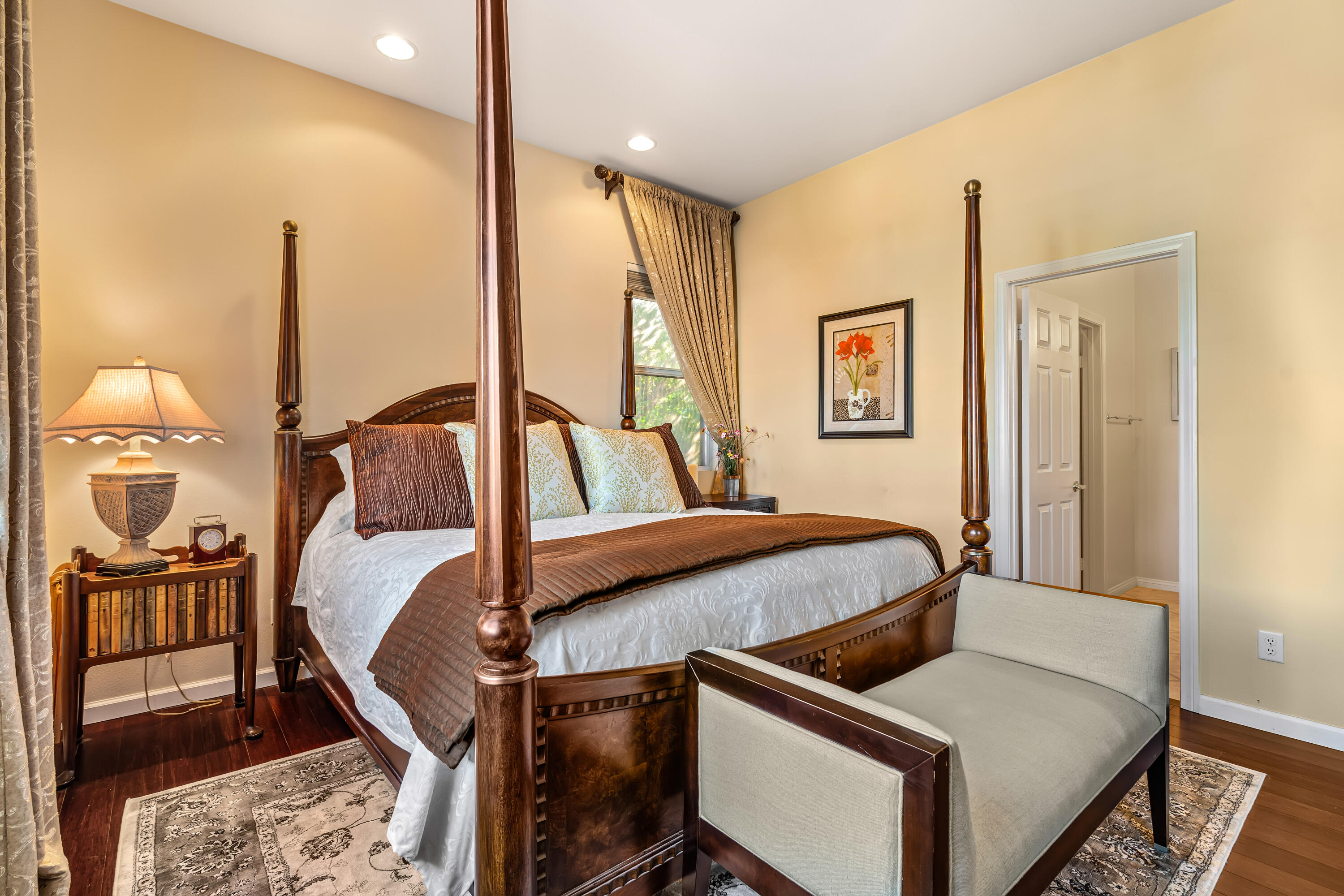 80607 Prestwick Place Indio, CA 92201 - Photo 36 of 68 a bedroom with a bed and wooden floor