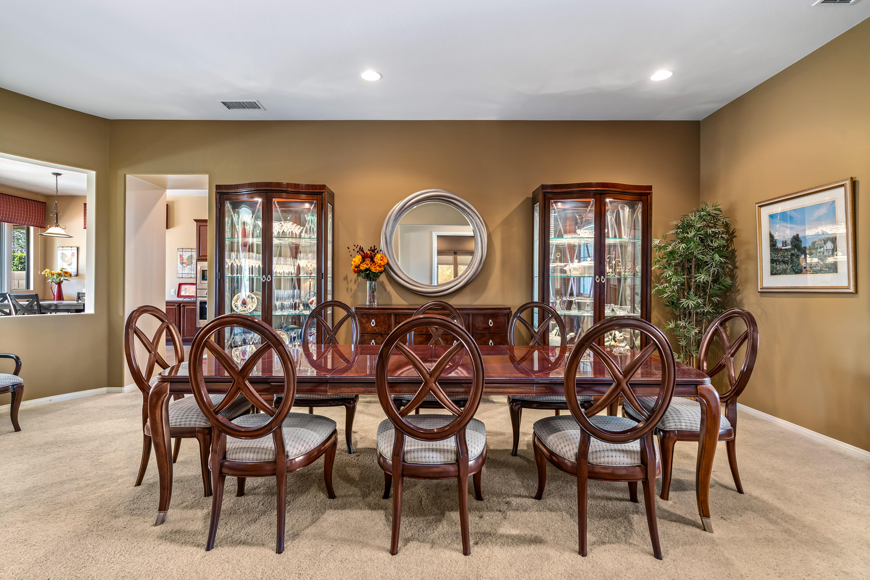 80607 Prestwick Place Indio, CA 92201 - Photo 9 of 68 a view of a dining room with furniture and a large window